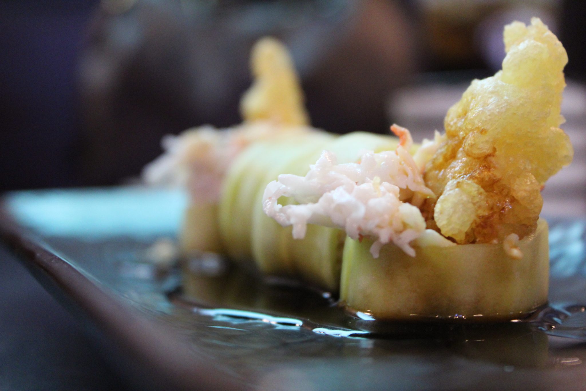 sushi rolls with shrimp tempura and cucumber